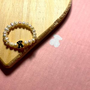 Tous pearl ring and a gold bear
